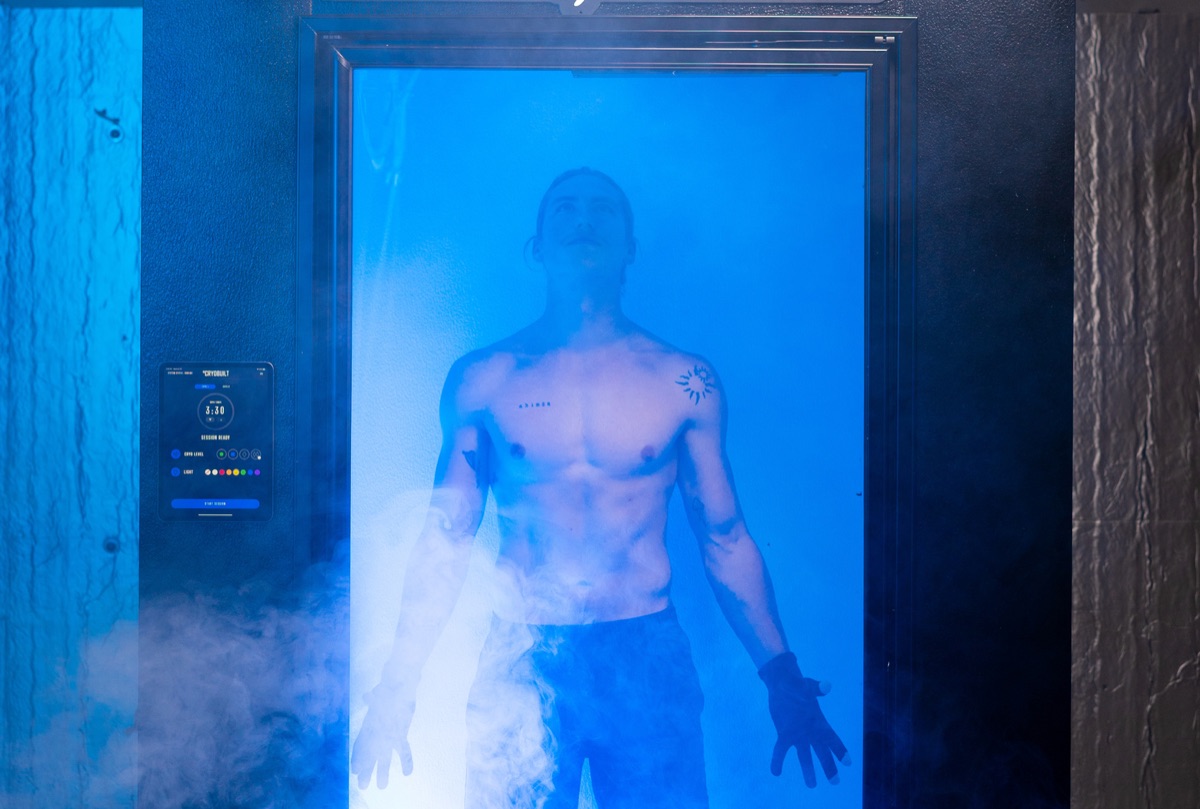 Man in CryoBuilt Everest whole-body cryotherapy chamber at Bionic Barbell Las Cruces