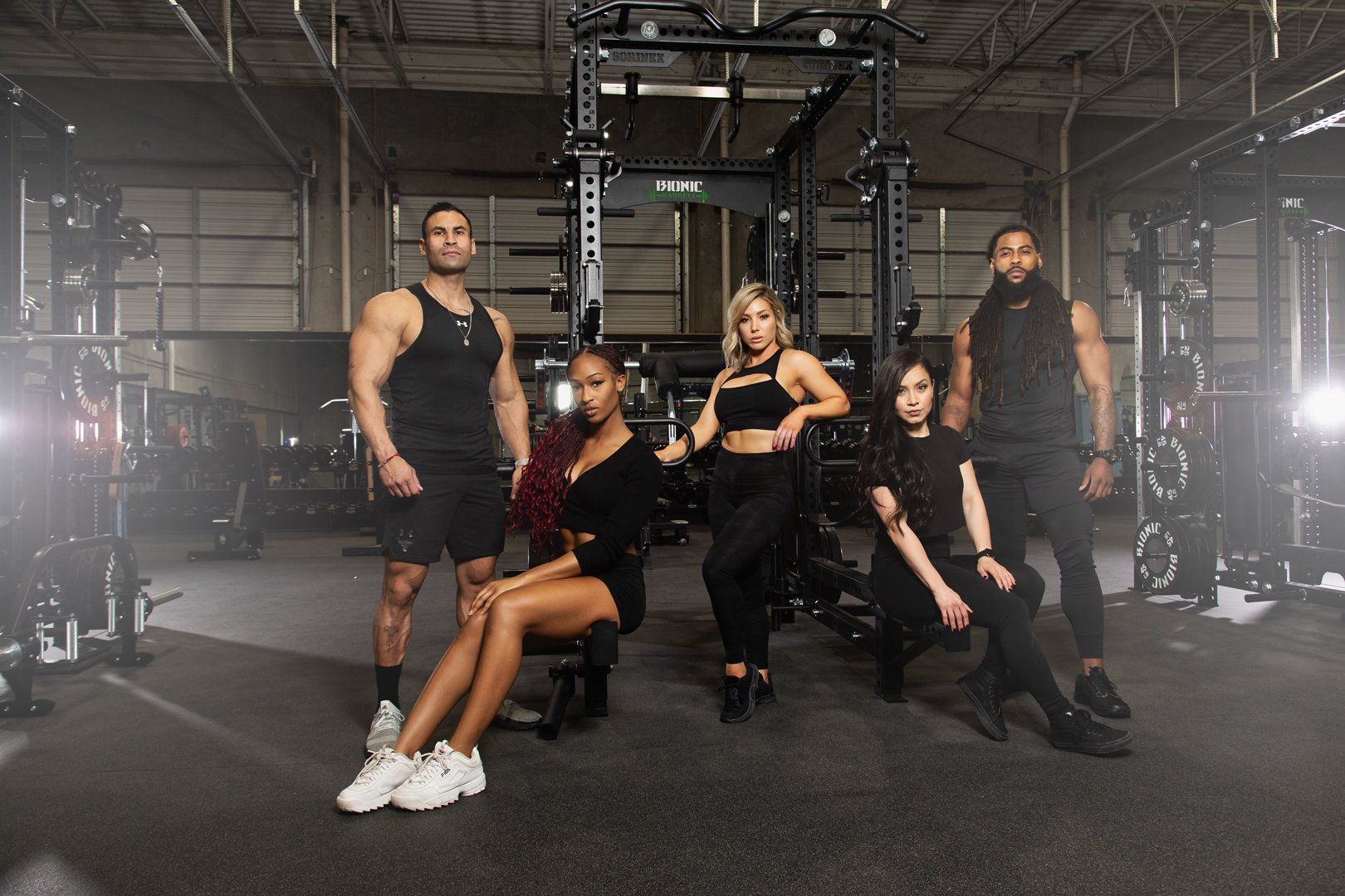 Group of diverse members enjoying fitness classes together at Bionic Barbell